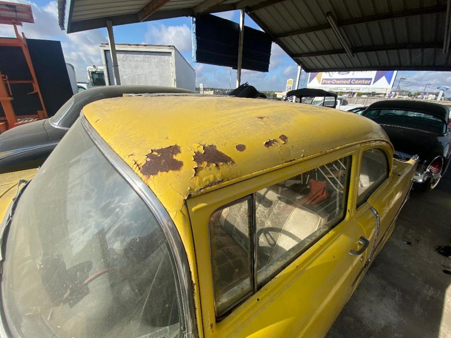 1957 Yellow /Tan Chevrolet 150 (C56A020067) with an 327 V8 engine, 4 Spd transmission, located at 1687 Business 35 S, New Braunfels, TX, 78130, (830) 625-7159, 29.655487, -98.051491 - Sittin under a shed find!! 1957 Chevrolet 150 once in its life was running the drag strip. Miles unknown equipped with a 327 V8 paired with a 4 speed transmission within a shatter proof bell housing. 12 Years in New Braunfels previously race car in California. Ready for total restoration - Photo#7